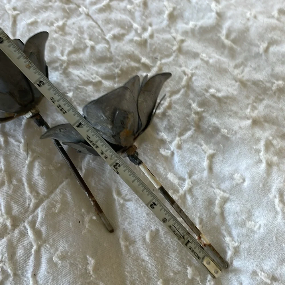 Metal flowers. Lot of 2. Handmade. 3 inches wide. 4 inches tall.